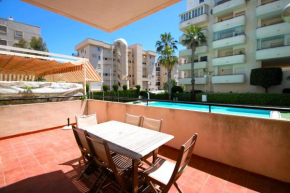 Apartamento CasaTuris en Los Arenales del Sol AR102 con terraza y piscina